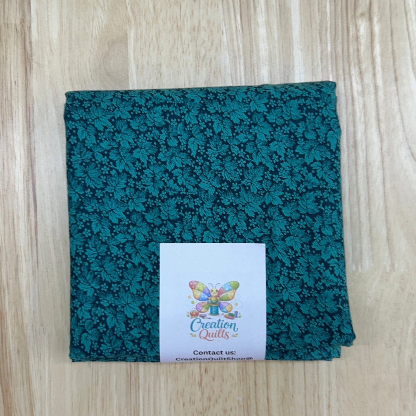 Cranston Print Works teal leaves