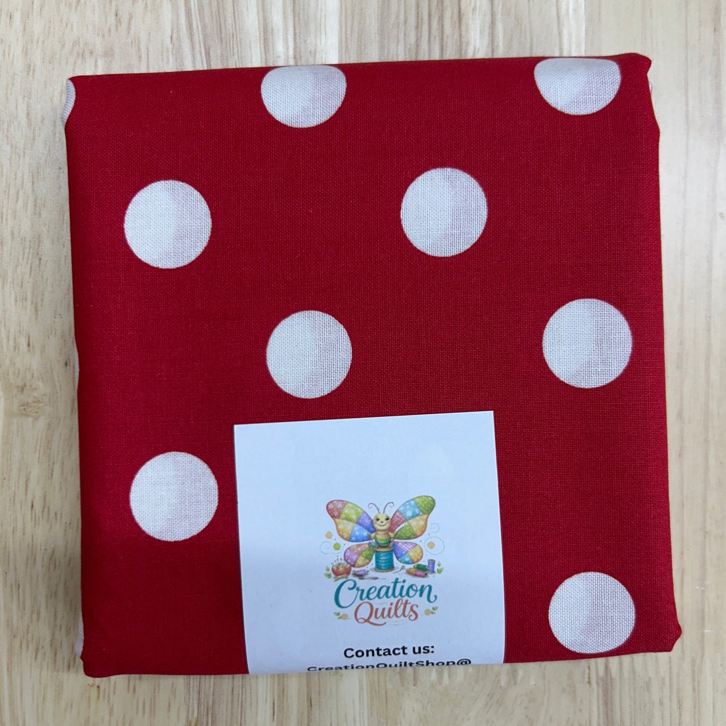 Red with large white polka dots