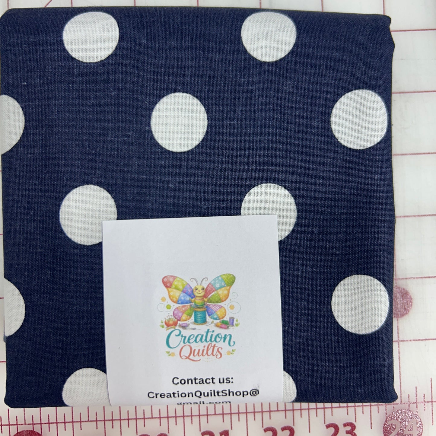 Navy with white polka dots